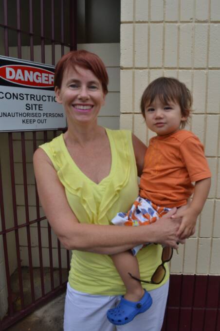 SUCCESS: Annette Pham, with son Adam, outside the construction site that will become the Nowra Aquatic Centre, the first place in NSW to have an accredited Changing Place toilet for people with a profound disability.