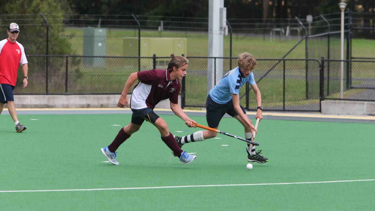 BALL ROLLING: Kangaroo Valley’s James Hayes tries to stop Bluejays’ Danny Ball in their teams’ clash on Saturday.