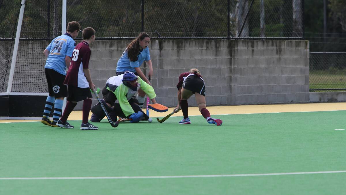 GAME SAVER: Bluejays goalkeeper Madeline Gaffney made many saves on Saturday, this time stopping Kangaroo Valley’s Sophie Jones.