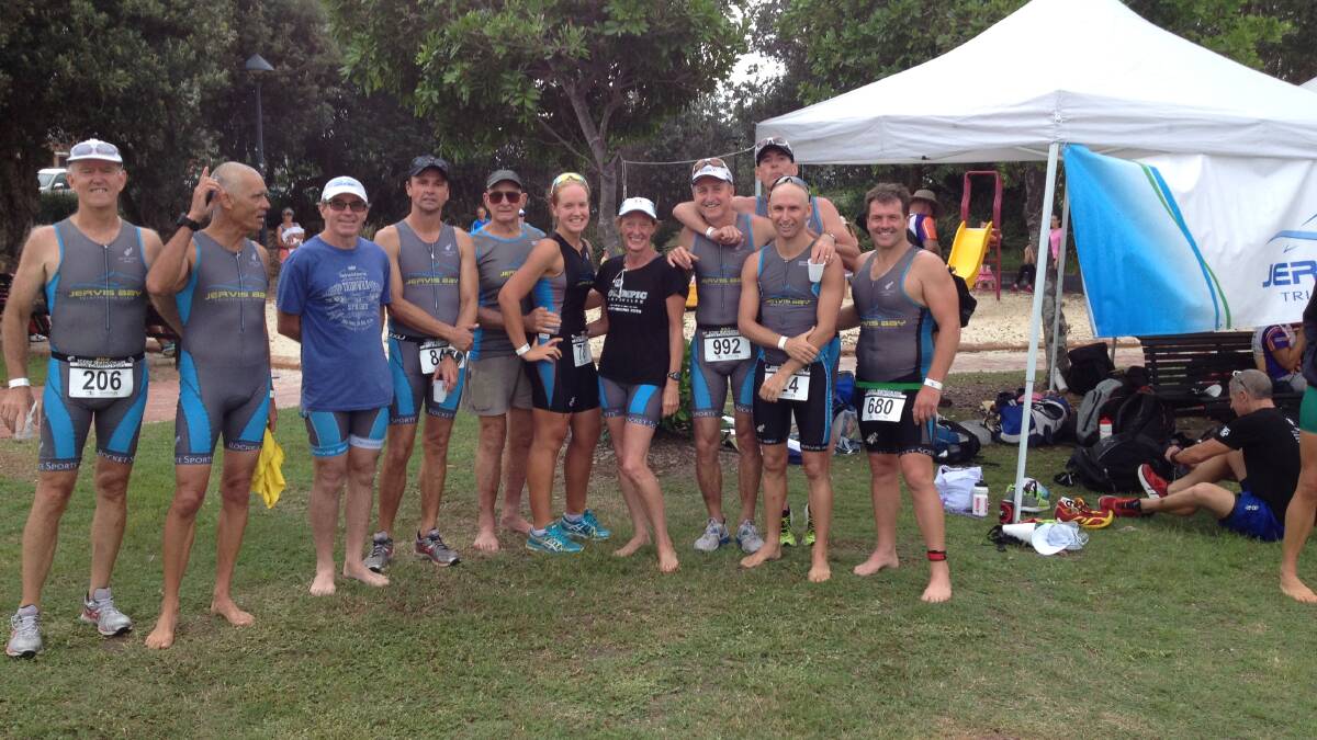 DONE AND DUSTED: Jervis Bay Triathlon Club members Rod Rose, Tony Lim, Kendall McMaster, Stephen Moore, Paul Coombes, Katie Winkworth, Annette Sampson, Bill Stahlhut, Rodney Crouch, Dave Edwards and Tim O’Connell relax after the Scody Triathlon NSW Club Championships.