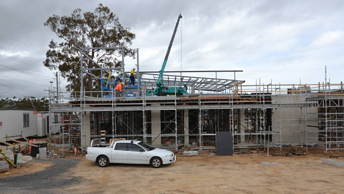 RISING: The GP Super Clinic, under construction in Nowra, has had its future secured.