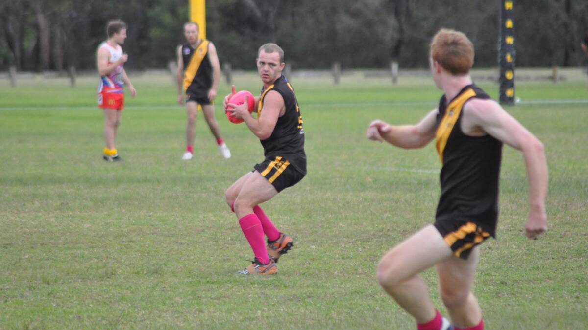 LOOK FOR A BREAK: Bomaderry Tigers’ Jeremy O’Byrne during last week’s game against Wollongong Bulldogs. Photo: PATRICK FAHY
