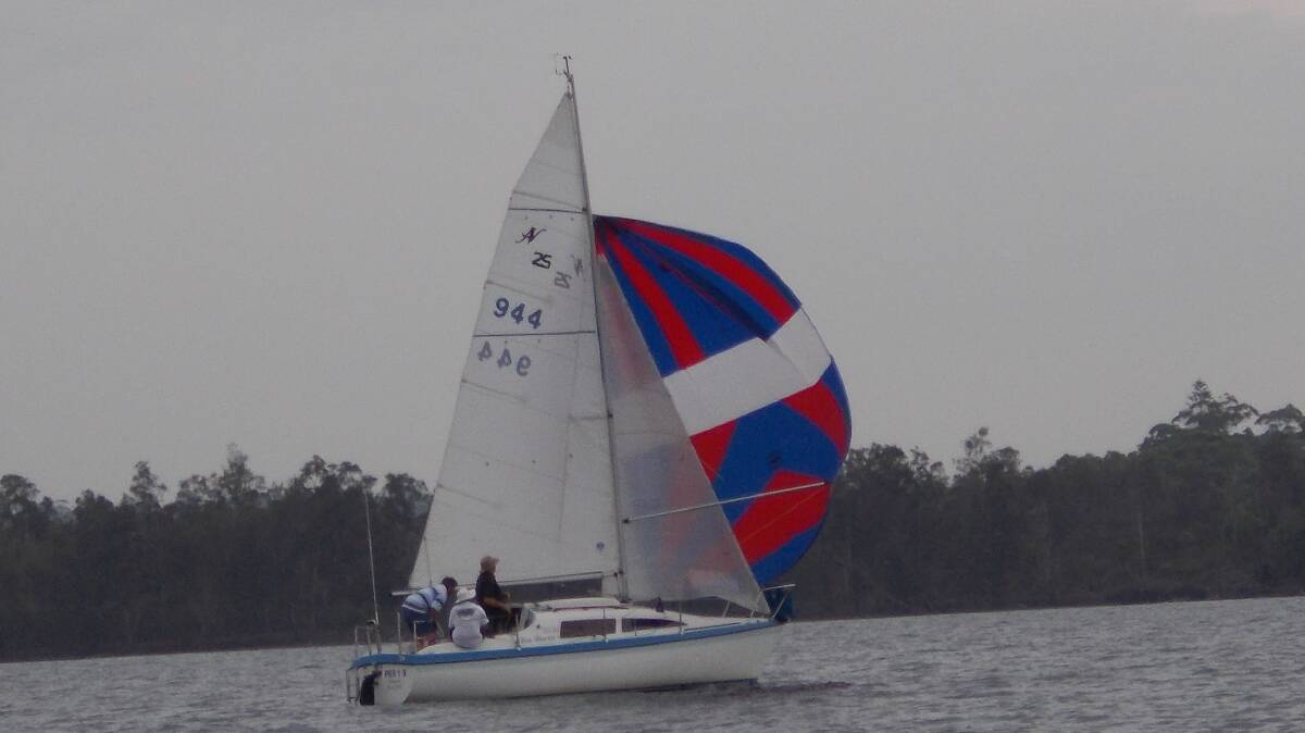SAIL AWAY: Bay Blues in downwind in light conditions.