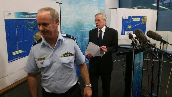 John Young from AMSA and Air Commodore John McGarry from Defense addressed a press conference by the Australian Maritime Safety Authority in relation to the disappearance of Malaysian Airlines flight MH370 in Canberra. Photo: Andrew Meares 