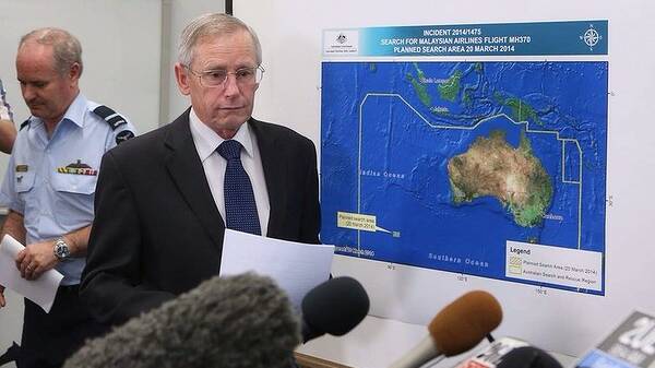 John Young addressed a press conference by the Australian Maritime Safety Authority in relation to the disappearance of Malaysian Airlines flight MH370 in Canberra. Photo: Andrew Meares 