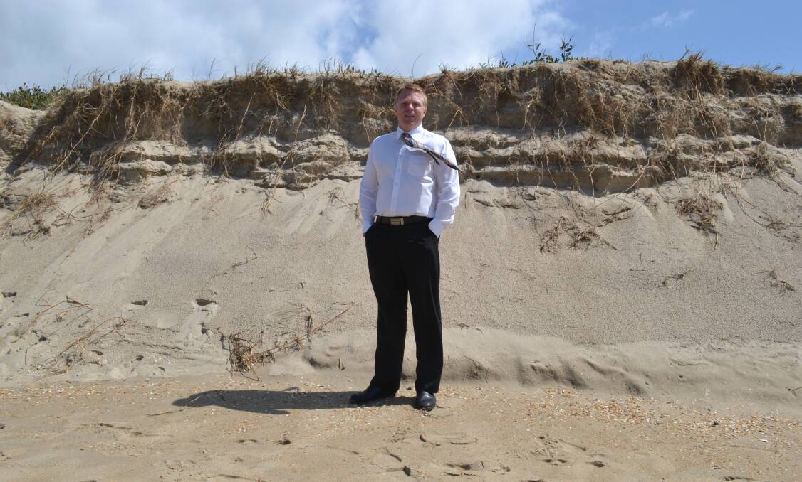 DANGER: Shoalhaven Heads Surf Club president Karl Poulton says signs should be in place warning visitors of unstable dunes.