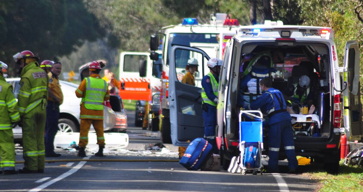 COLLISION: Emergency services at the scene of the fatal collision on Bolong Road on Thursday.