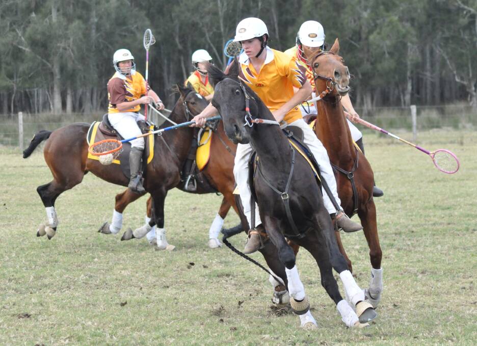 HUSTLE AND BUSTLE: Milton-Ulladulla player Luke Wilford takes possession during a clash with Burradoo at the Worrigee Polocrosse Carnival on Saturday. Photo: PATRICK FAHY 