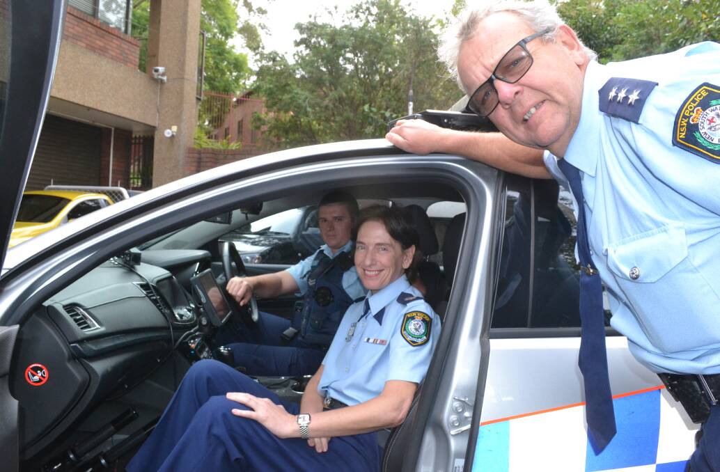 ON MESSAGE: NSW Police Deputy Commissioner Catherine Burn chats with Shoalhaven Highway Patrol officer Senior Constable Dave Taylor and relieving Southern Region Traffic Tactician Acting Inspector Allan McCulloch during her visit to the Shoalhaven.