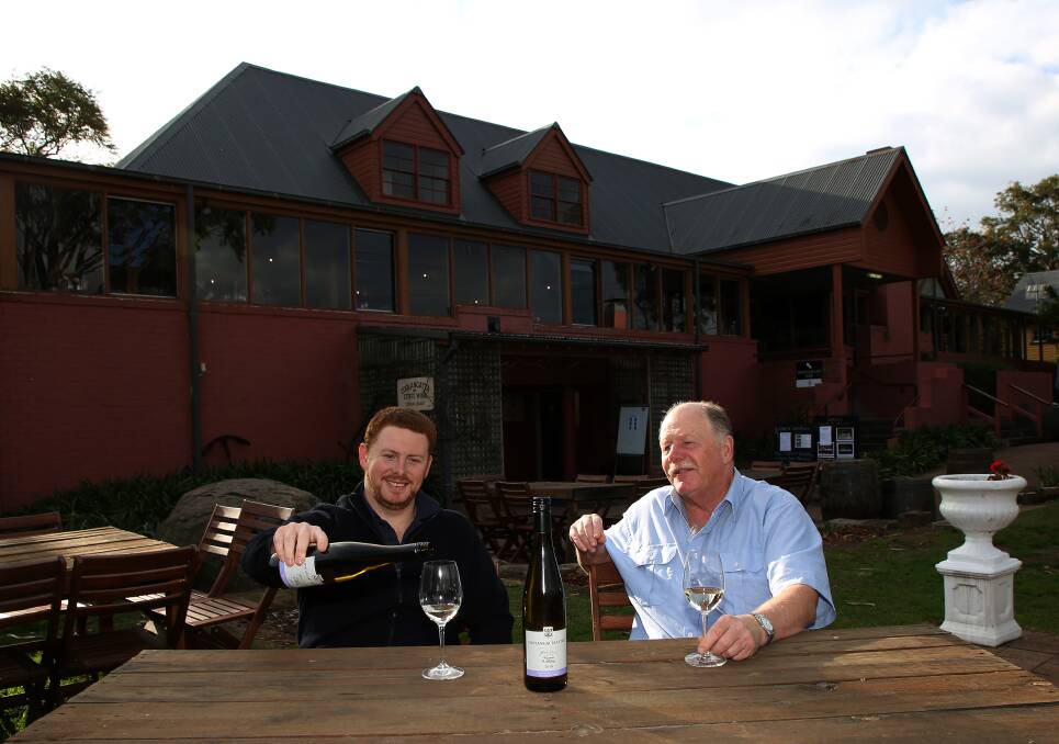 Winner winner: Ben Bishop and Greg Bishop with the 2018 Winsome Riesling that won the 2000th wine award for Coolangatta Estate. Picture: Greg Ellis. 