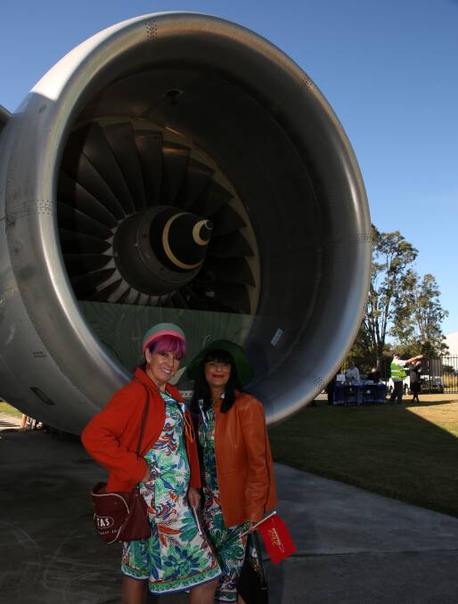 Qantas style: Linda Connell and Julie Mellae were dressed in uniforms Pucci was asked to design for the late 70s and early 80s. They are worth around $1200 a uniform now. Picture: Greg Ellis