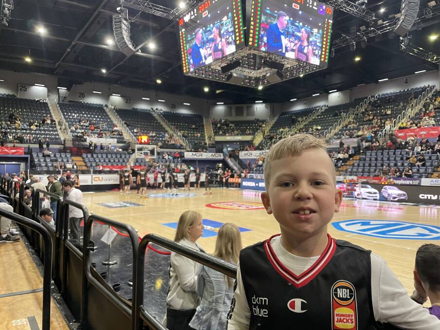 HAWKHEAD: Young Flynn Hutchinson at a recent Illawarra Hawks game at the WIN Entertainment Centre. Picture: Supplied (by dad Matt).