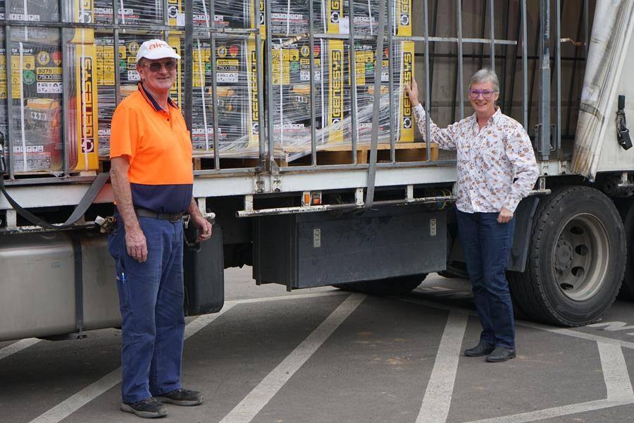  Air CL Transport Driver Peter Pellew and Shoalhaven City Council Mayor Amanda Findley with the truckload of donated generators. Photo: supplied.