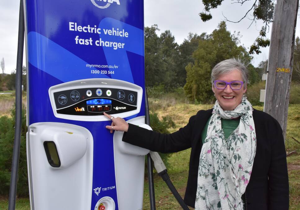 Electric: Shoalhaven Mayor Amanda Findley charging a new electric car at the NRMA fast charging station in Berry.