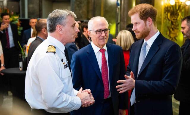 Captain Shane Craig with former Prime Minister Malcolm Turnbull and Prince Harry. Photo: Supplied.