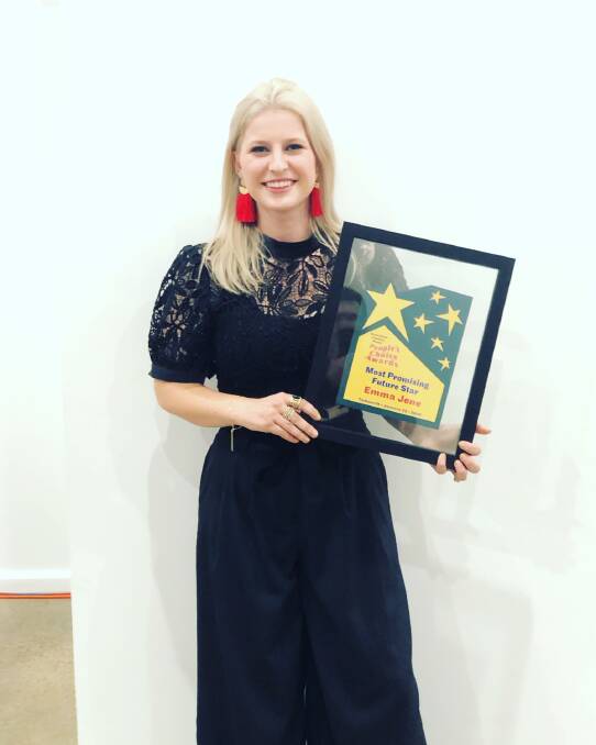 Country music artist Emma Jene with her People's Choice Award for Most Promising Future Star. Photo: supplied. 