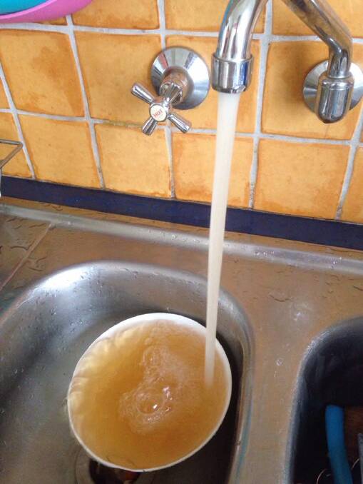 Brown tap water at one Nowra home. Credit: Kelly Quinton. 