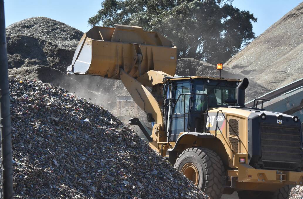 A front end loader operating at Shoalhaven Recycling's facility in Bomaderry. 