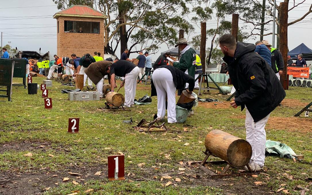Axemen prepare for a woodchop event at the 2020 Nowra Show. 