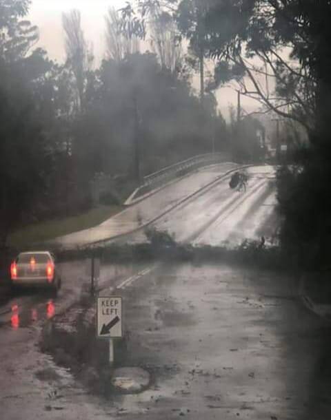 Water over the road at Badgee Bridge in Sussex Inlet. Photo: Mandy Cropper.