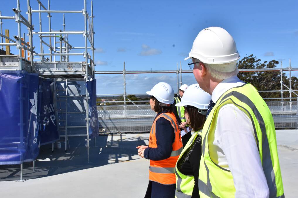NSW Premier Gladys Berejiklian, South Coast MP Shelley Hancock and Kiama MP Gareth Ward inspecting the car park in September. 