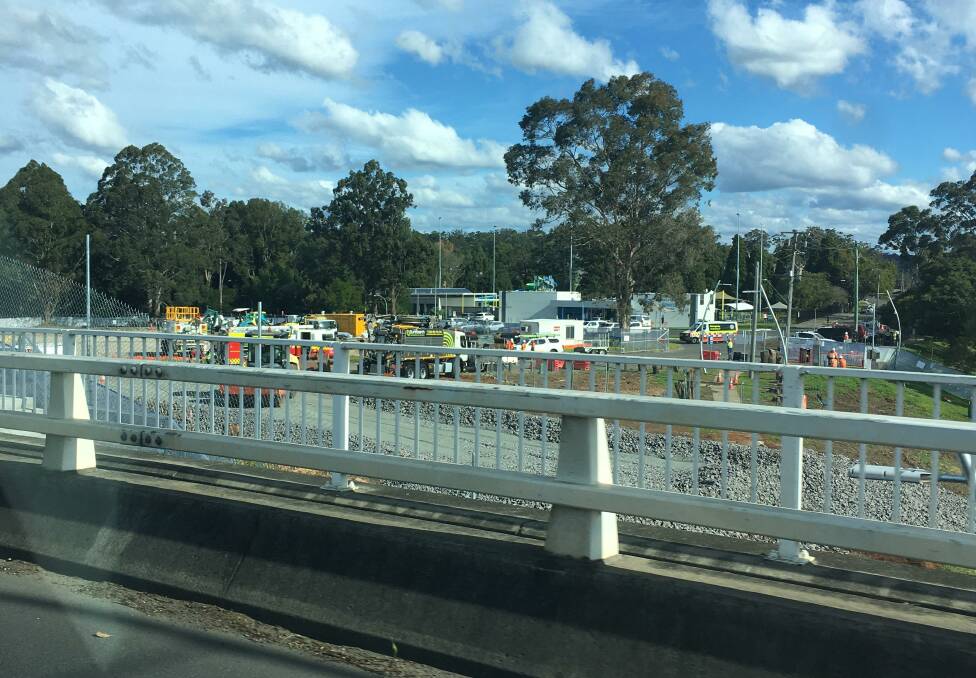 Fire and Rescue trucks and ambulance on the scene of the gas leak at the Nowra Bridge work site.