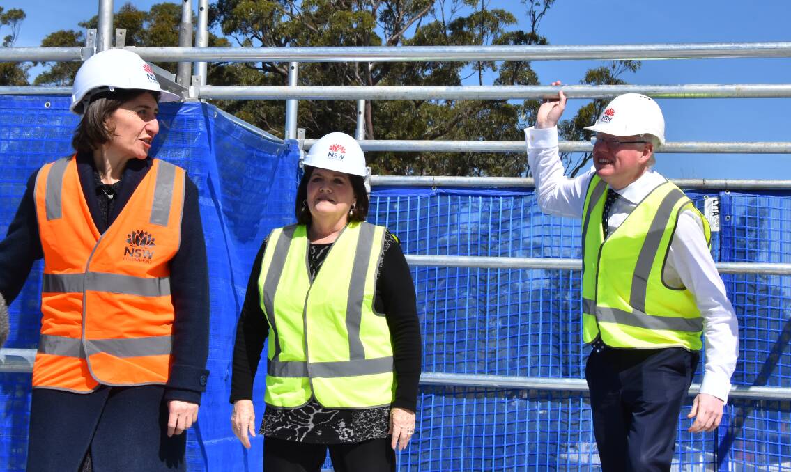 High-up: NSW Premier Gladys Berejiklian, South Coast MP Shelley Hancock and Kiama MP Gareth Ward on the Shoalhaven Hospital car park roof. 
