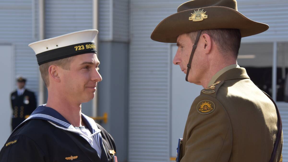 Leading Seaman Shaun Remfry with reviewing officer Chief of Defence General Angus Campbell.