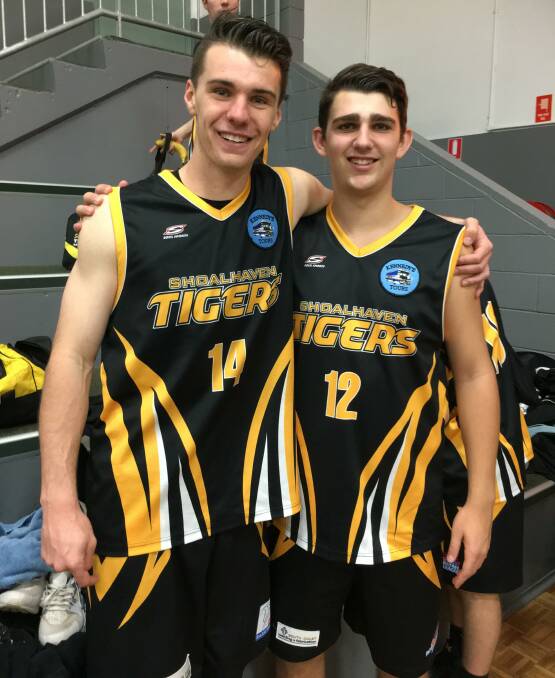 CHAMPIONS: Riley O'Shannessy and Jeremy Harding after their Waratah League youth men division two championship win over the Illawarra Hawks.
