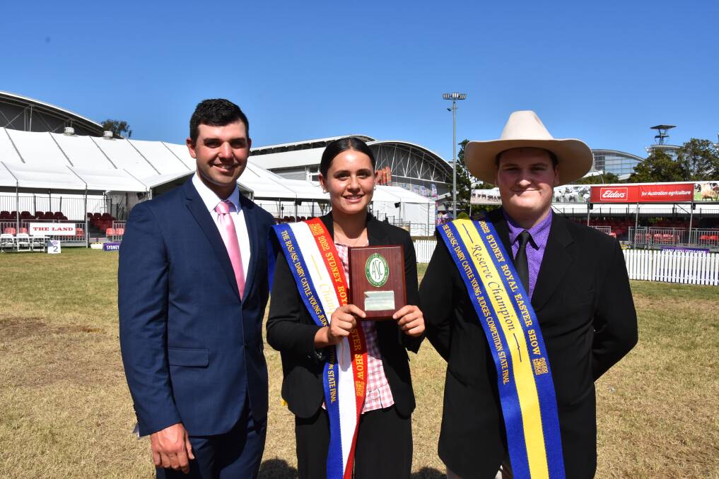 TOP JUDGE: RAS/ASC Young Judges Dairy State Final judge Cameron Yarnold, Wingham, with winner Elly Simms, Numbaa, and reserve champion Lachlan Moore from Taree.