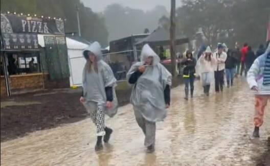 FLOODED: "It's hell in there" was how @paigeroy described day one of Splendour in the Grass on her TikTok page. Picture: TikTok/@paigeroy