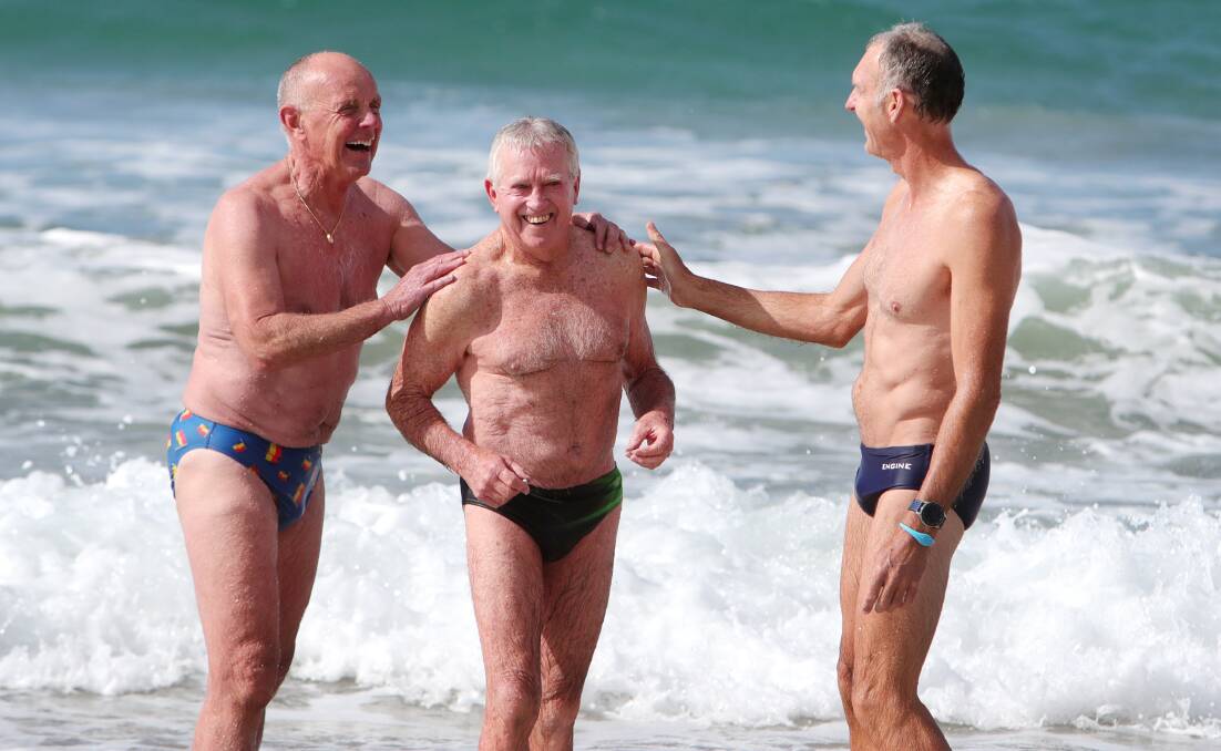 Silver Salties members Allan Hutton, 70, Lloyd Jones, 82, and Ian Sakoff, 55, at Thirroul Beach. Picture by Sylbia Liber