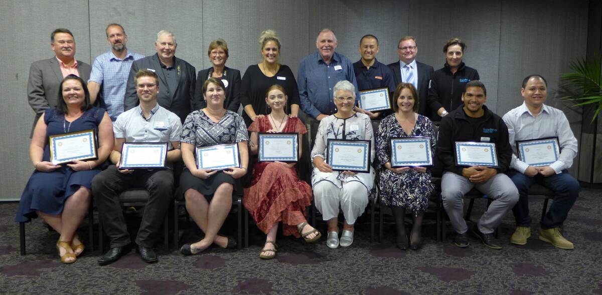 Pride of Work winners are - Front row (from L to R), holding their "Pride of Work" award certificates - employees Melanie Sebbens (North Nowra Friendly Grocer), John Gwilliam (Roxy Theatre), Linda Reeve (Remos Bakery), Jasper Almond-Smith (Stella Studioz), Sandra Reminis (Remos Bakery & Bakehouse Delights), Melissa Cox (NowChem), Paul Ardler (Booderee National Park), Ken Wu (Cambewarra General Store/Post Office). 

Back row (from L to R) - Managers and supervisors, Rob Russell (Vocational Services Director, Rotary Nowra), Daniel Regnaut (North Nowra Friendly Grocer), Bob Brainwood (Roxy Theatre), Polly Hill (President, Rotary Nowra), Sian Ludlow (Stella Studioz), John Reminis (Remos Bakery), James Lim (Good Price Pharmacy) James was also representing his award recipient, Rita Able, who was unable to attend. John Lamont (NowChem) and Michelle Callaway (Parks Australia). 