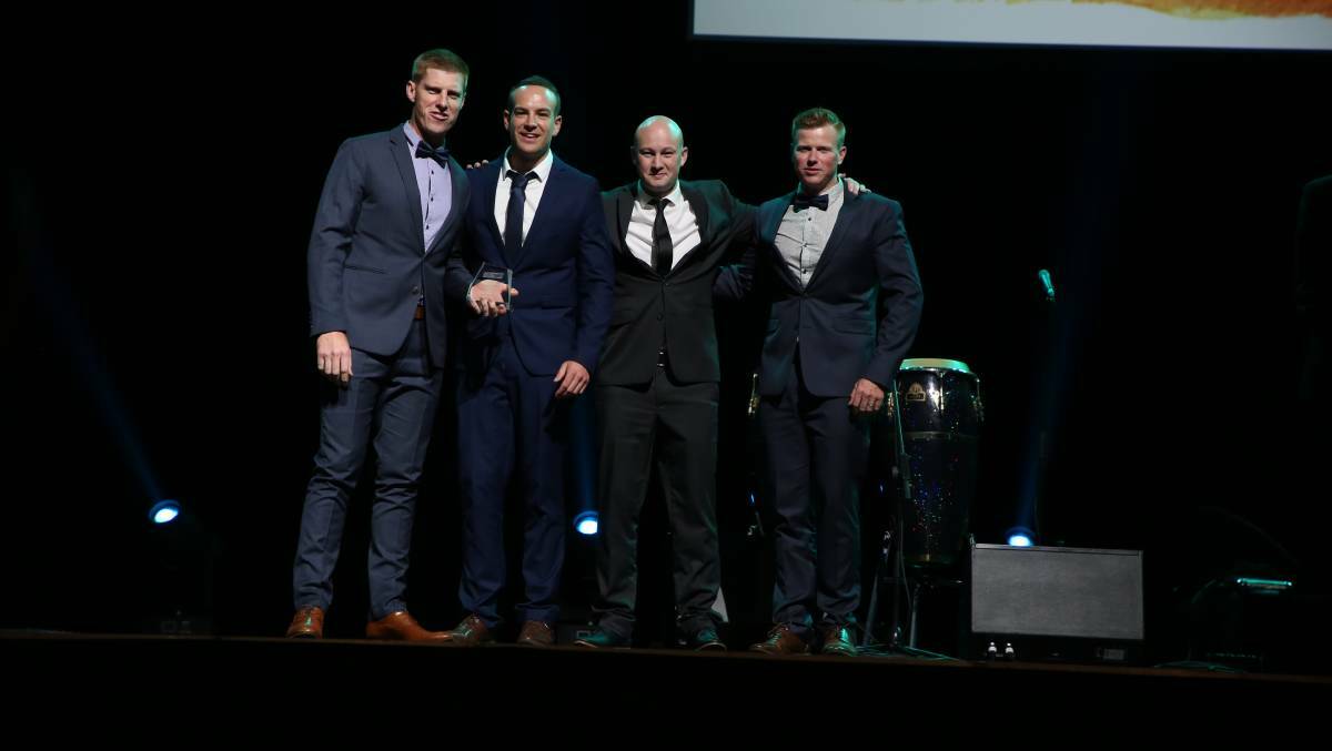 J&T Dale Plumbing's Tom Dale, Aaron Westor, Brett Ringland, Jamie Dale accept the Excellence in Small Business award at the 2019 IMB Bank Illawarra Business Awards.