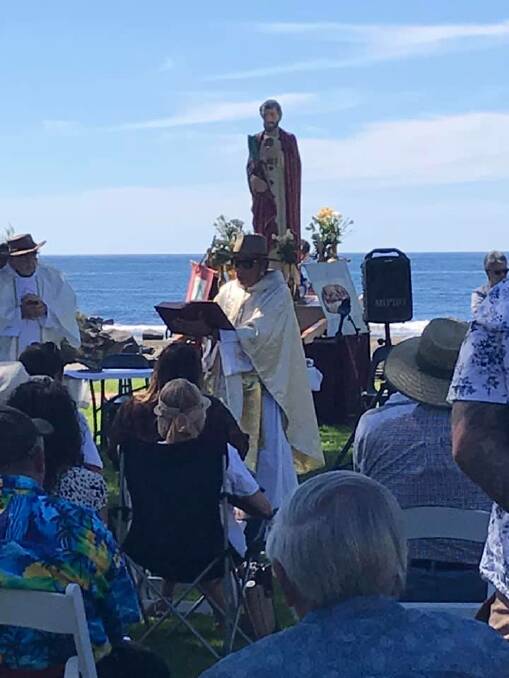  A smaller scale Blessing of the Fishing Fleet ceremony was held in 2021. Picture here Father Michael with the statue of St Peter.