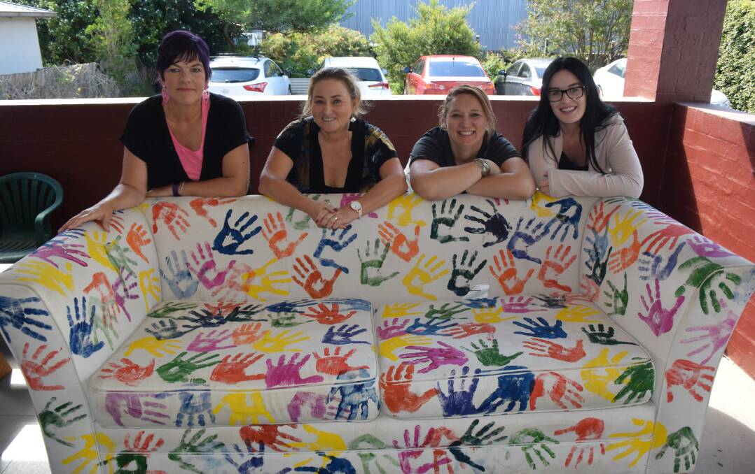 Sally Lamb headspace Nowra, Wendi Hobbs Shoalhaven Youth Health, Sam Kettlewell headspace Nowra and TAFE student Jess McAlister with their great couch.