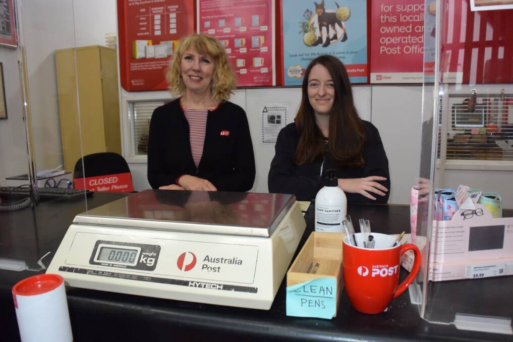 Carolyn Mott [left] with Taryn Murray who has worked at the Milton Post Office since 2015.