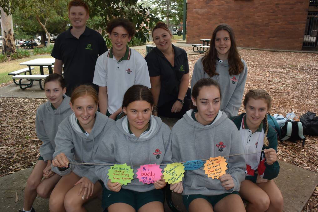 Joel and Sam from headspace with some Bomaderry High students as they continue their anti-bullying stance.