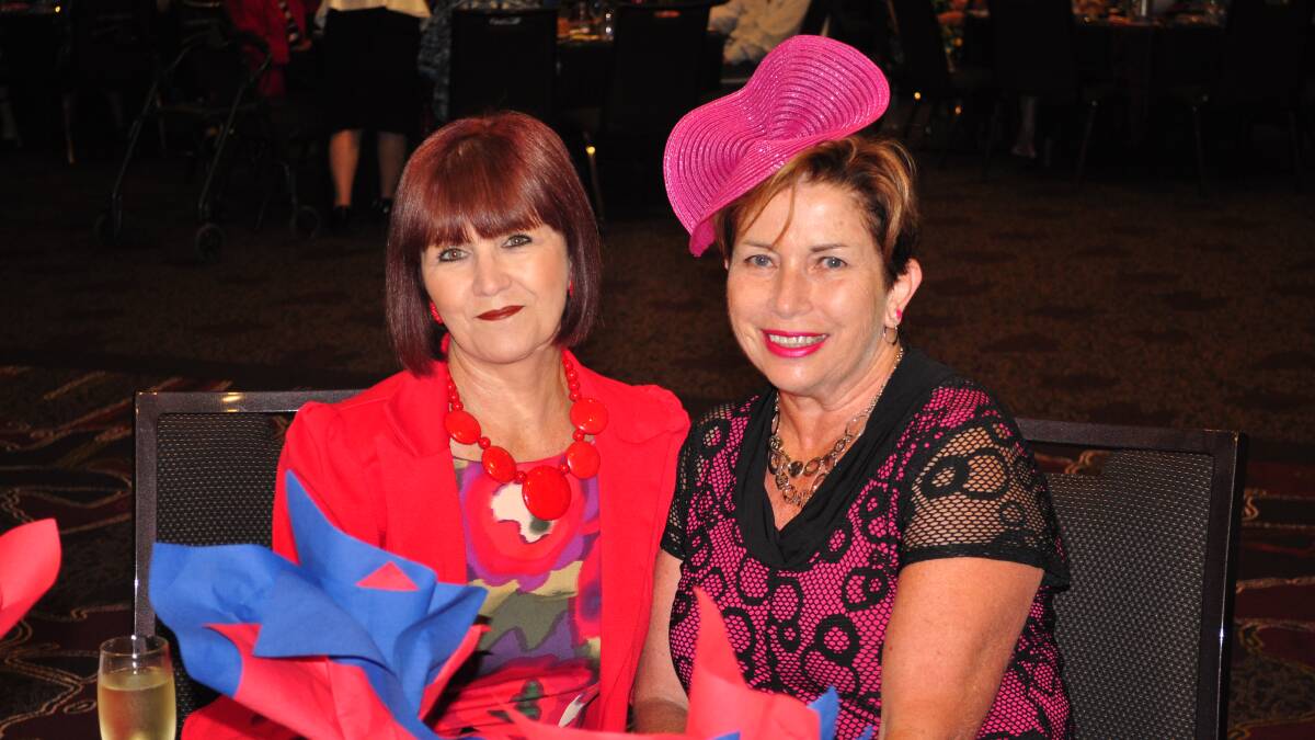 TAKE A PUNT: Karen Ambrose (Tapitallee) and Katriona Higham (Shoalhaven Heads) lead the way in the fashion stakes.