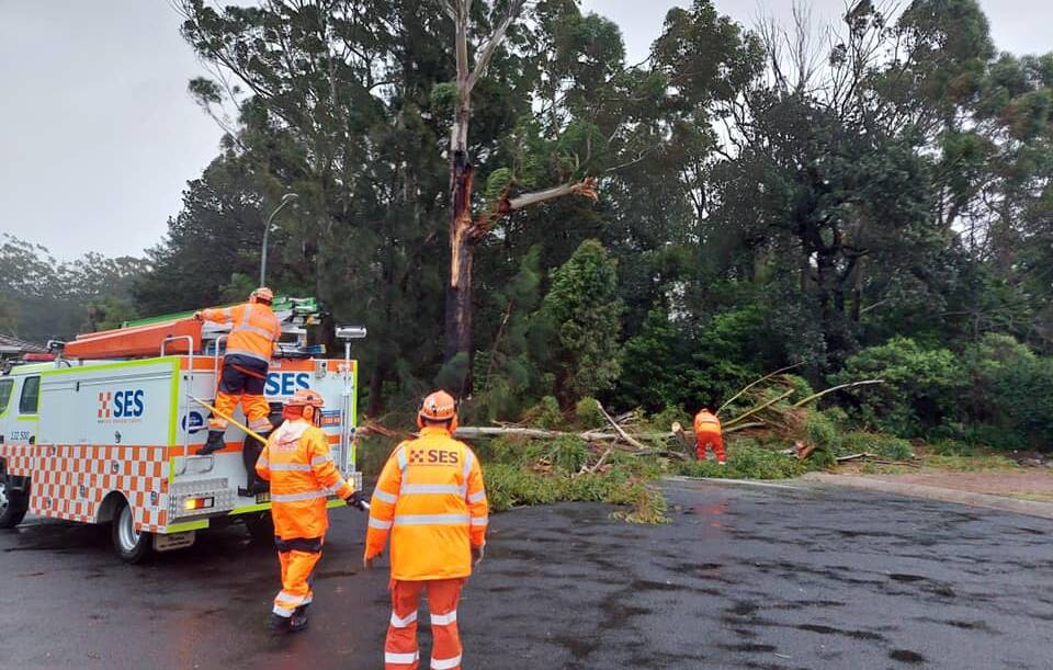 HELPING HAND: Shoalhaven based SES volunteers working during the wild weather which has struck large parts of the Shoalhaven. Images: Supplied