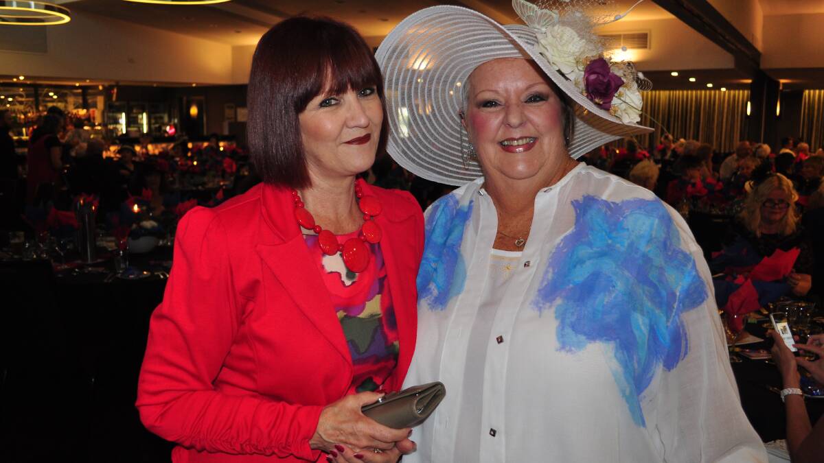 LOVE THE LOOK: Karen Ambrose (Tapitallee)  and Robbie Allen (Terara) put the glamour into race day.