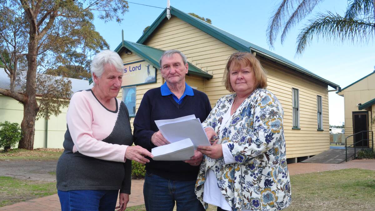 Community members Cath and Bill Hunter, along with Patricia White want to save their church.