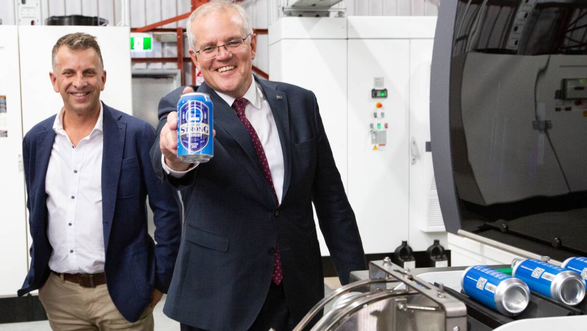 Andrew Constance and Scott Morrison visited East Coast Canning in the electorate of Gilmore on the first day of the election campaign. Picture: James Croucher