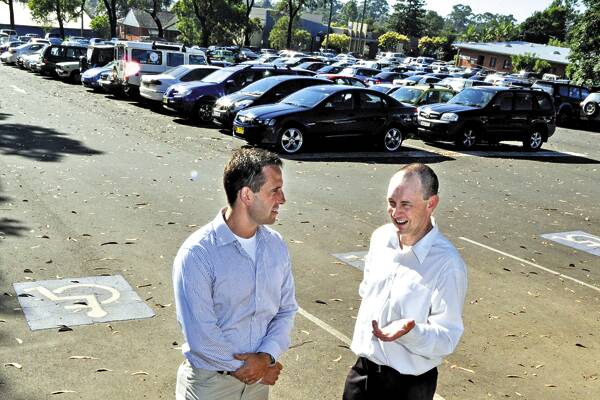 GRAND PLANS: Member of the Nowra CBD Parking Development Committee George Parker talks with civil structural engineer Stephen Faulkner about the potential for a multi-storey car park at the Worrigee-Berry street car park.