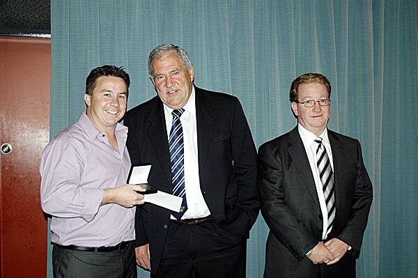 MEDAL AWARD: Right - Warilla-Lake South first grade coach Peter Hooper (left) accepted the Michael Cronin Medal on behalf of winner Alex Volkanovski from Michael Cronin (centre) and Kiama Leagues Club general manager John Bambury.