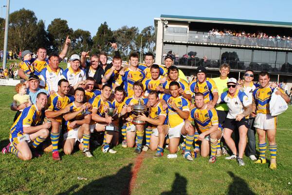 2011 CHAMPS: The Warilla-Lake South Gorillas celebrate their 36-6 VB South Coast Group 7 grand final win over Gerringong at Centenary Field yesterday.