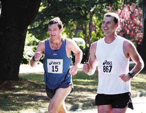 RUNNING MATES: Julien Wicks (right) and Roy Daniell competing in the Canberra marathon earlier in the year.