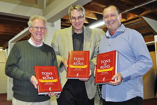 LOCAL LAUNCH: Shoalhaven cricket recorder, life member and South Coast Register cricket writer Alan Clark (left) who contributed 1800 Shoalhaven century makers for Tons of Runs was pictured with author Paul Daley (centre) and Shoalhaven cricket president David Sloane.