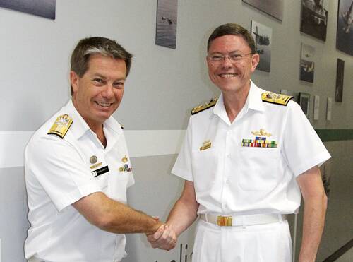 NEW ROLE: Former HMAS Albatross Commanding Officer, Rear Admiral Tim Barrett (left) pictured receiving best wishes from outgoing Commander Rear Admiral Allan du Toit. Photo and Story courtesy of the Navy News