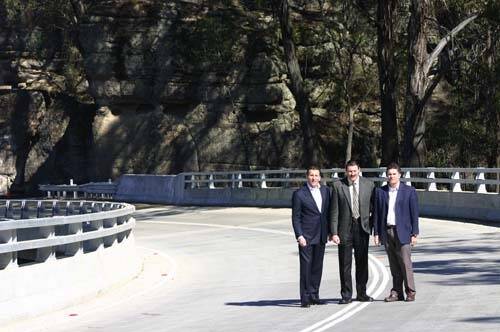 THREE AMIGOS: State Member for Kiama Matt Brown, Federal Member for Eden-Monaro Mike Kelly, and State Member for Monaro Steve Whan at stage two of Main Road 92 on Friday.